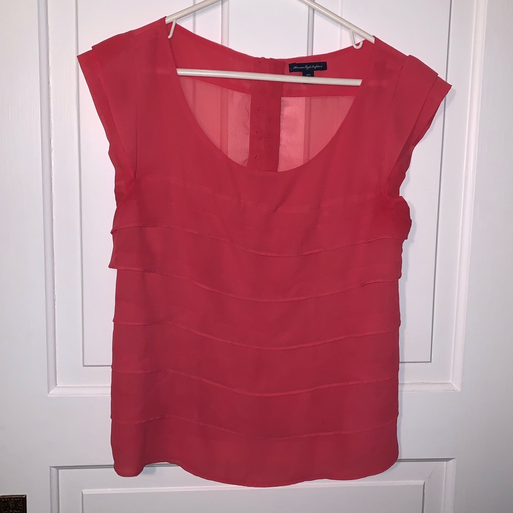 Pink Ruffle Blouse With Button Detail On Back